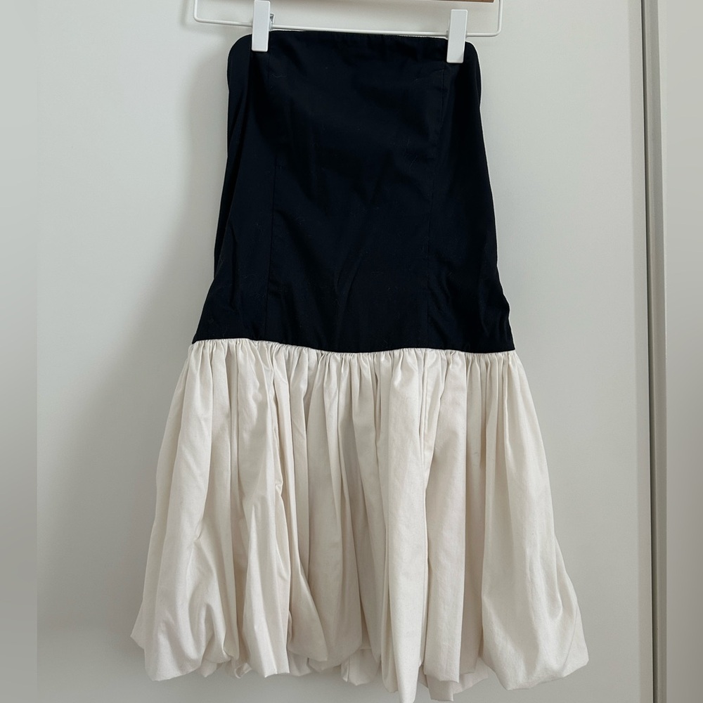 Black and white strapless mini dress with bubble hem